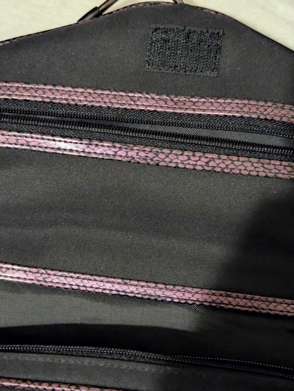 NWOT Americana By Sharif Black Fold-Over Hanging Cosmetic Bag With Purple Trim.